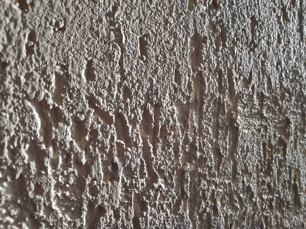 Texture of rough white concrete plaster