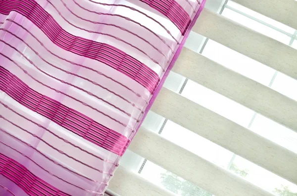 Window blinds and purple curtain — Stock Photo, Image