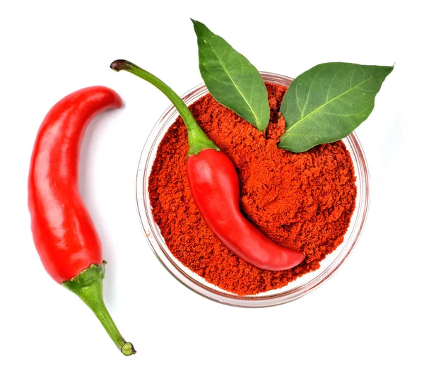 Chili peppers, spice chili powder and plant leaves isolated on white background. — 스톡 사진