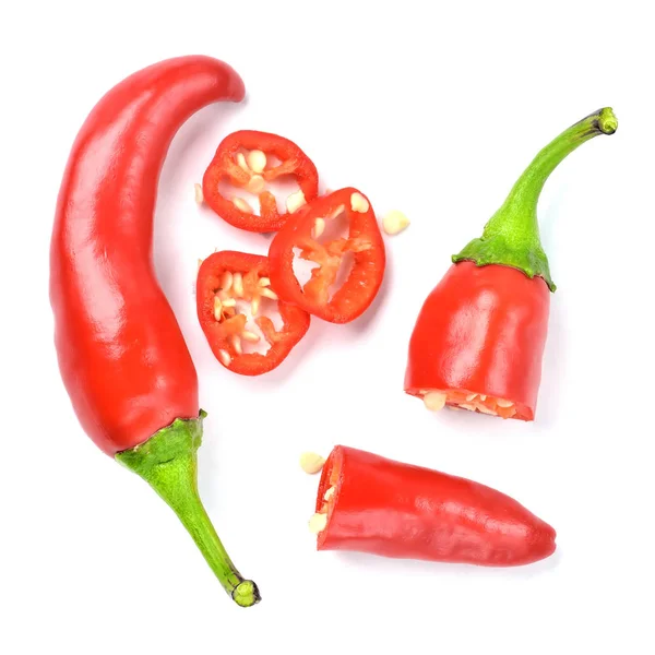 Half pieced chilli pepper and slices isolated on white background. — 스톡 사진