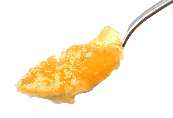 Lžíce medu izolované na bílém pozadí. — Stock fotografie