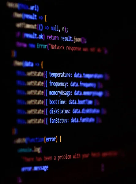 Kode sumber pemrograman perangkat lunak pada layar komputer Javascript modern, typescript, kode skrip ekma dengan React Framework. Foto vertikal . — Stok Foto