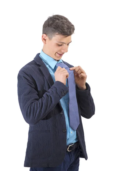 Portrait of leisure cool smart boy binding his tie — Stock Photo, Image