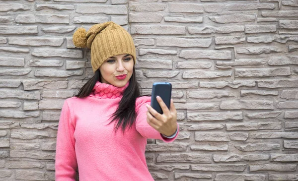 Girl taking selfie with smartphone camera outdoors — Stock Photo, Image