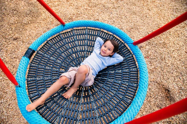 Little Girl Having Fun One Rounded Swing — Stock Photo, Image