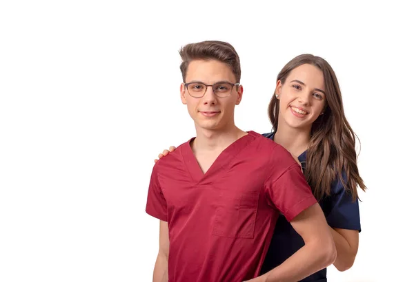 Hermosos médicos jóvenes aislados sobre blanco —  Fotos de Stock