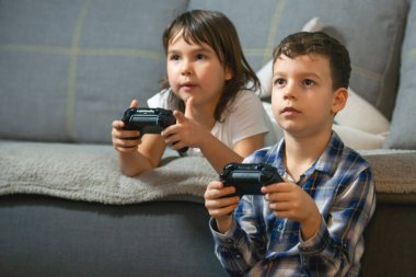kids playing console games durring covid 19 outbreak clipart