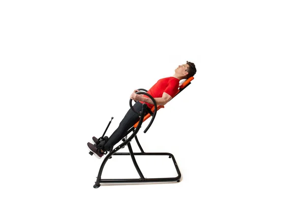 Man Doing Exercise Inversion Table His Back Pain Isolated White — Stock Photo, Image