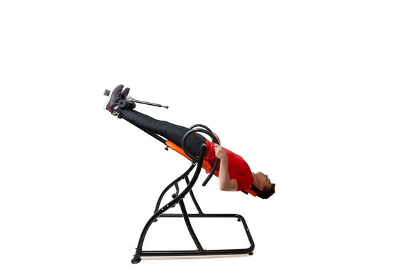 Man Doing Exercise Inversion Table His Back Pain Isolated White — Stock Photo, Image