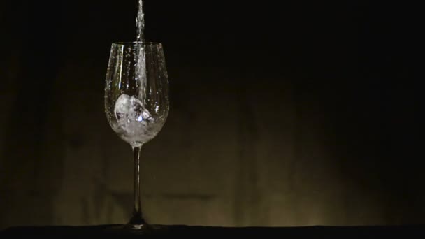 Liquid poured into a glass — Stock Video