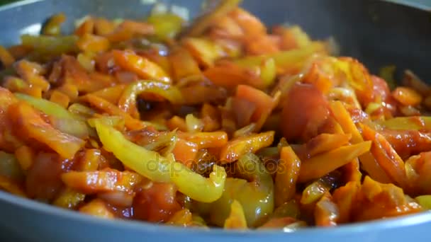 Different vegetables in a frying pan — Stock Video