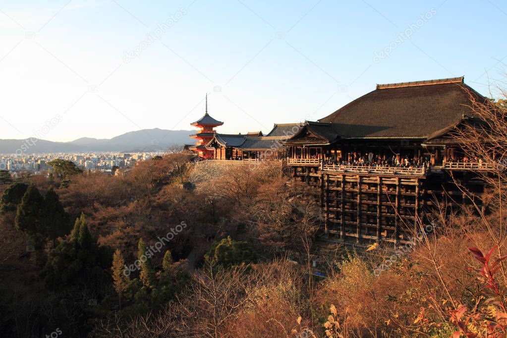 main hall and three-story pagoda of Kiyomizu dera in Kyoto, Japan (evening scene)