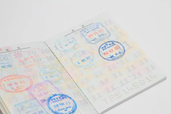 Много виз на японский паспорт — стоковое фото