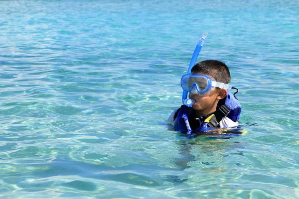 Japanese boy swimming with snorkel (second grade at elementary school) — Stock Photo, Image