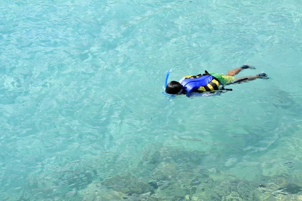 Japanese boy swimming with snorkel (second grade at elementary school) — Stock Photo, Image