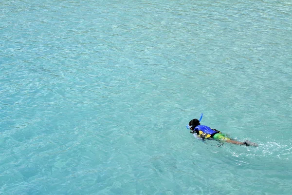 Japanese boy swimming with snorkel (second grade at elementary school) — Stock Photo, Image