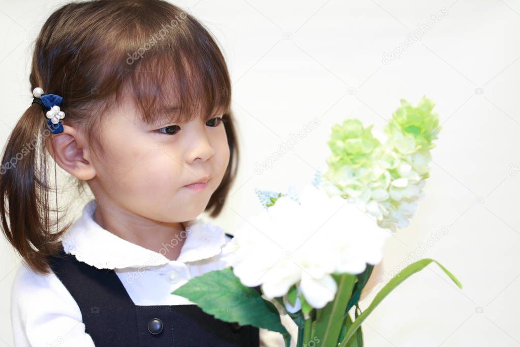 Japanese girl in formal wear with flowers (2 years old)