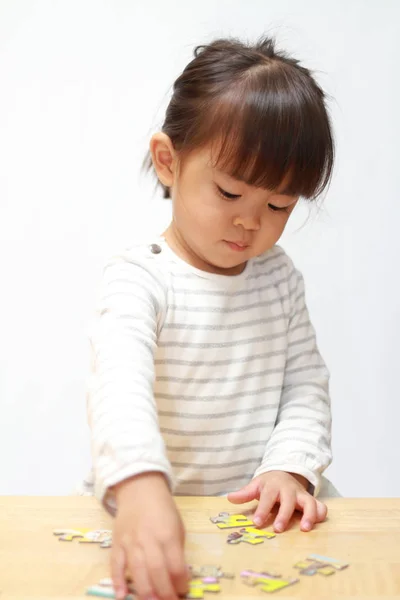 직소 퍼즐 (3 세를 하 고 일본 여자) — 스톡 사진