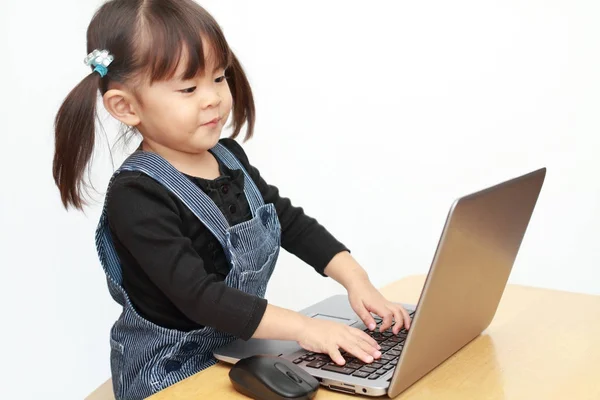 Japanese girl using notebook PC (3 years old)