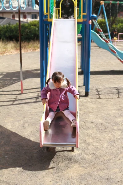 Japanese girl on the slide (3 years old)