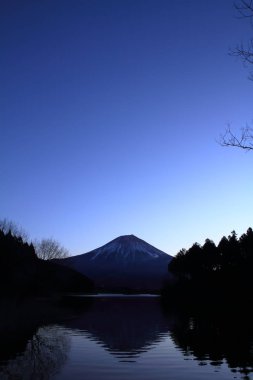 Mt. Fuji, view from Tanuki lake, Shizuoka, Japan (before dawn) clipart