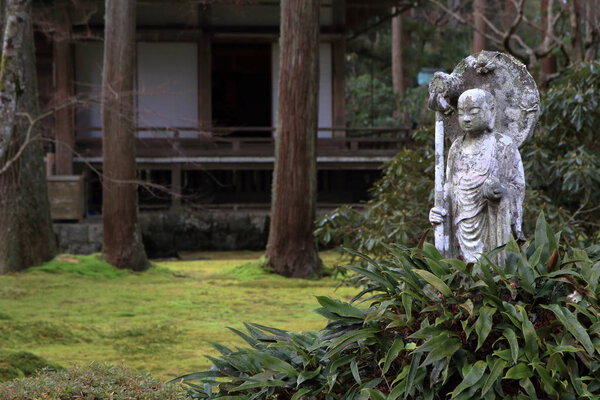 statue of Buddha and moss garden of Sanzenin in Kyoto, Japan