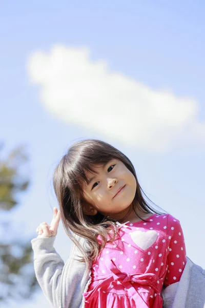 Japanese girl under the blue sky (5 years old)