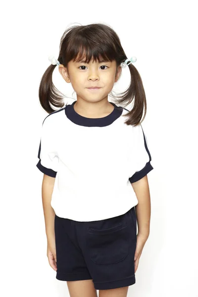 Japansk tjej i sportkläder (4 år) (vit rygg)) — Stockfoto