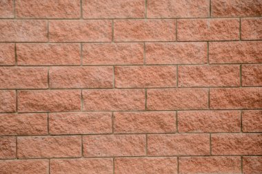 Kirli pembe tuğla dokusu.