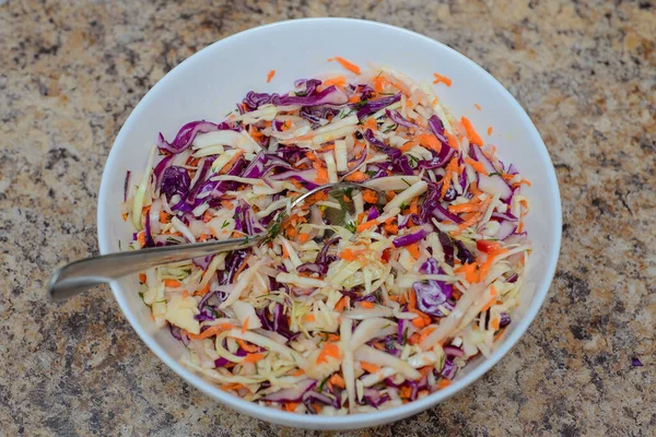 Salad Cabbage Blue Red Cabbage Onions Carrots White Plate Spoon — Stock Photo, Image