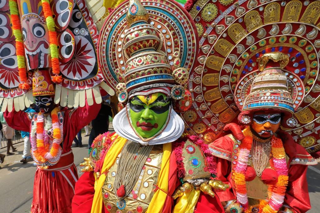 Unidentified mask dancers at a Theyyam and Kathakali ceremony Stock