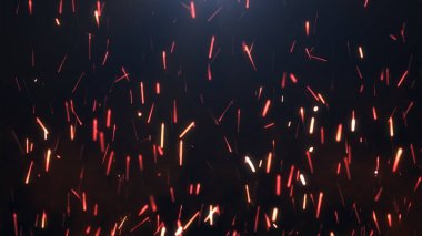 Karanlık bir arka plan üzerinde sparks