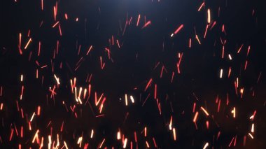 Karanlık bir arka plan üzerinde sparks