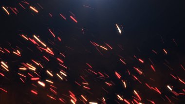 Karanlık bir arka plan üzerinde sparks