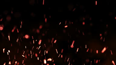 Güzel ateş gece, karanlık arka planda kıvılcım. Döngü animasyon.