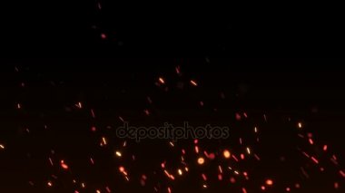 Güzel ateş gece, karanlık arka planda kıvılcım. Döngü animasyon.