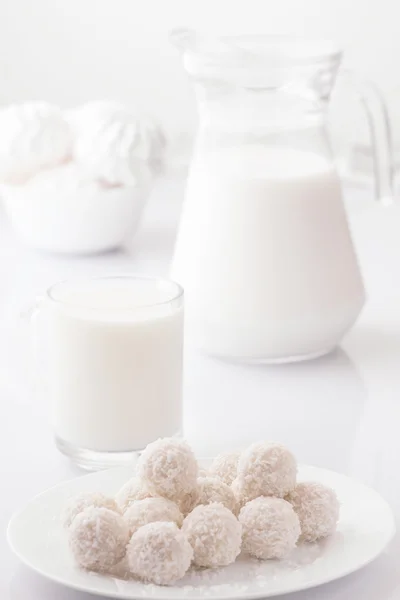 morning breakfast milk and candy. White background
