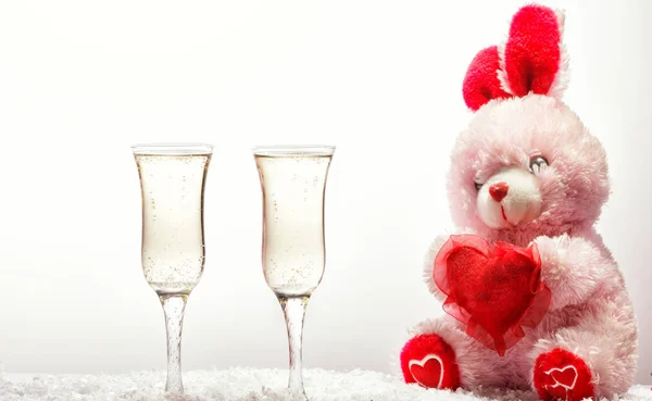 Romantic still life with pink champagne and beautiful red rebit. Valentines day concept. — Stock Photo, Image