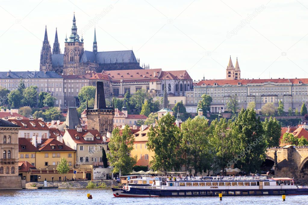 Prague, Czech Republic skyline with historic Charles Bridge. Boat cruise on Vltava river