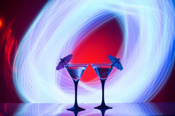Two glasses of martini coctail in a bar — Stock Photo, Image
