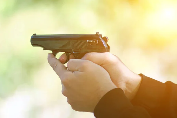 Close-up image of the muzzle of a gun at spring sunny background — Stock Photo, Image