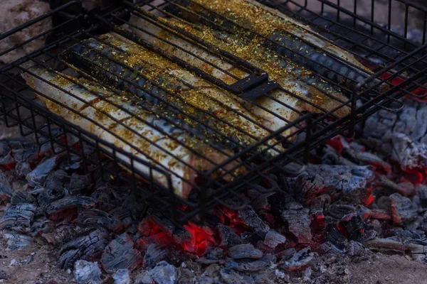 Grill fish fire mackerel food grilling flame, meal closeup.