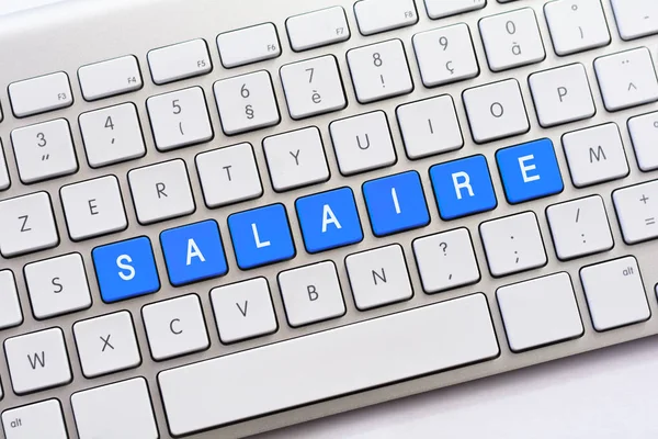 SALAIRE scrittura su tastiera bianca — Foto Stock