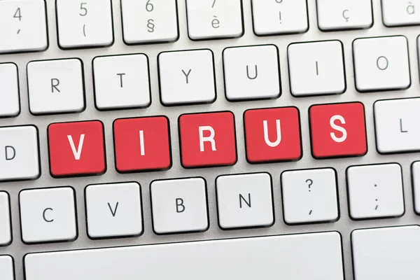 VIRUS запис на білій клавіатурі — стокове фото