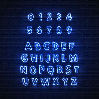 Latince neon yazı tipi. Parlayan alfabesi, elektrik standı, bir tuğla duvar arka plan, kaligrafi Abc..