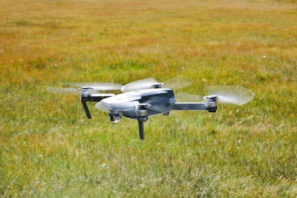 Drone flying over the field