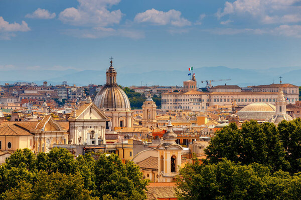 Aerial view of Rome from top of the Aventine hill on a sunny day.