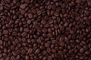 Pile of coffee beans on a white background clipart