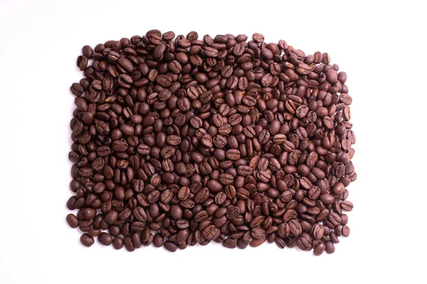 Pile of coffee beans  on a square shape on a white background — ストック写真