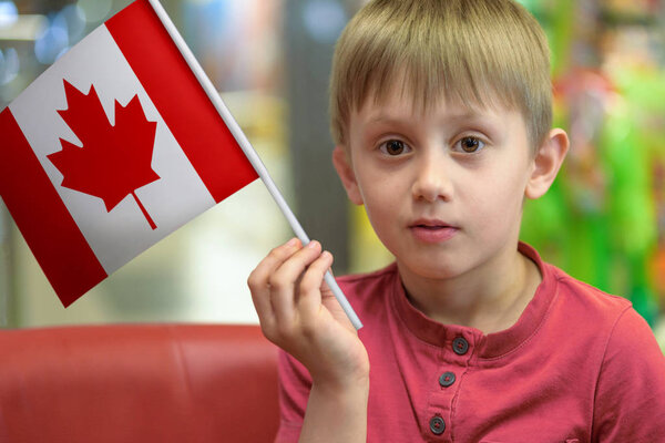 Boy with the flag of Canada